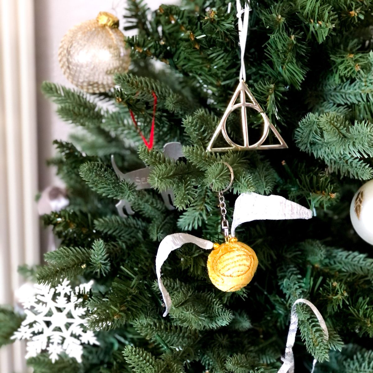 bookish Harry Potter ornaments on a Christmas tree